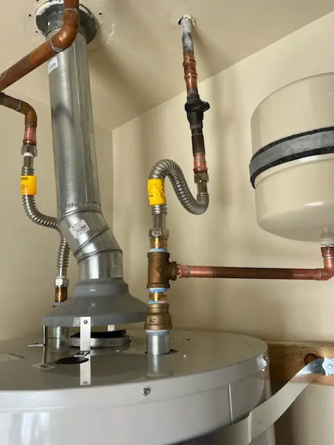 Water heater installation and plumbing repair in Mimosa Gardens